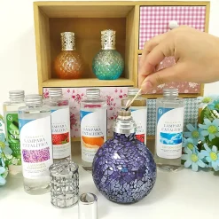 Mamamanuela Lampe catalytique Aqua Marina + Parfum Bed of Roses 500 ml - Élimine les mauvaises odeurs, parfume et améliore la qualité de l'air New