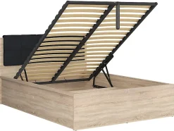 Pegane Lit adule 140x200 avec tête de lit capitonnée noir,sommier et rangement, coloris chêne Sonoma - L. 204,5 x P. 149 x H. 95/40,5 cm Outlet